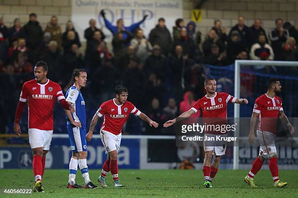 Dale Jennings of Barnsley celebrates his goal with team mates during the FA Cup Second Round Replay match between Chester City and Barnsley at Deva...