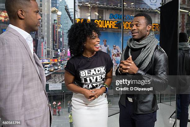 Calloway interviews Aunjanue Ellis and Lyriq Bent during their visit to 'Extra' at their New York studios at H&M in Times Square on December 16, 2014...