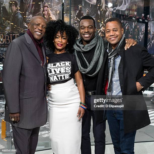 Louis Gossett Jr, Aunjanue Ellis, Lyriq Bent, and Cuba Gooding Jr visit 'Extra' at their New York studios at H&M in Times Square on December 16, 2014...