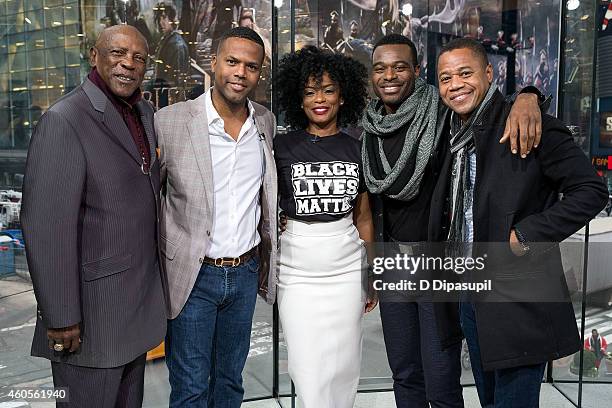 Calloway poses with Louis Gossett Jr, Aunjanue Ellis, Lyriq Bent, and Cuba Gooding Jr during their visit to 'Extra' at their New York studios at H&M...