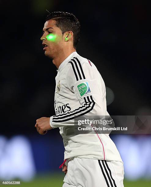 Laser is aimed at Cristiano Ronaldo of Real Madrid during the FIFA Club World Cup Semi Final match between Cruz Azul and Real Madrid CF at Marrakech...