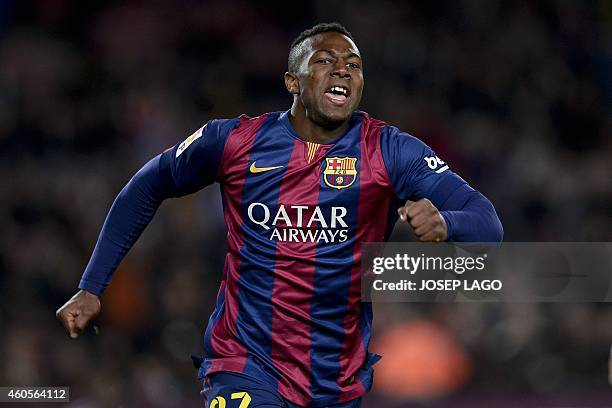 Barcelona's forward Adama celebrates his goal during the Spanish Copa del Rey round of 32 second leg football match FC Barcelona vs S.A.D. Huesca at...