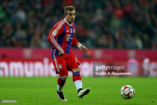 Xherdan Shaquiri of Muenchen runs with the ball during the Bundesliga match between FC Bayern Muenchen and SC Freiburg at Allianz Arena on December...