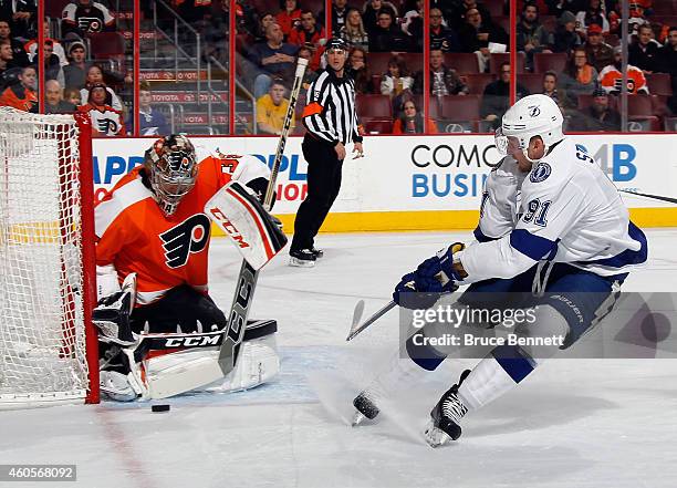 Steve Mason of the Philadelphia Flyers makes the first period save on Steven Stamkos of the Tampa Bay Lightning at the Wells Fargo Center on December...