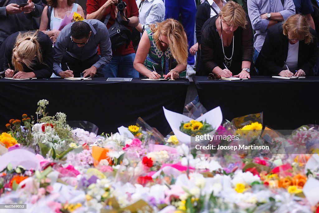 Sydney Pays Respect To Victims After 16 Hour Siege