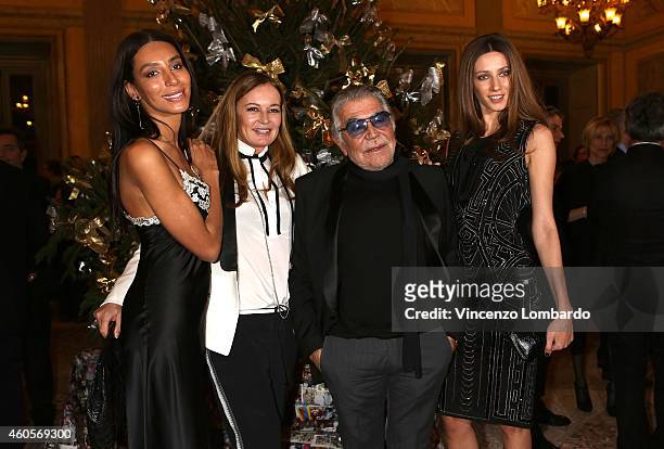 Lea T, Eva Cavalli, Roberto Cavalli and guest attend the "Fondazione IEO - CCM" Christmas Dinner For on December 16, 2014 in Monza, Italy.