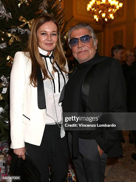 Eva Cavalli and Roberto Cavalli attend the "Fondazione IEO - CCM" Christmas Dinner For on December 16, 2014 in Monza, Italy.