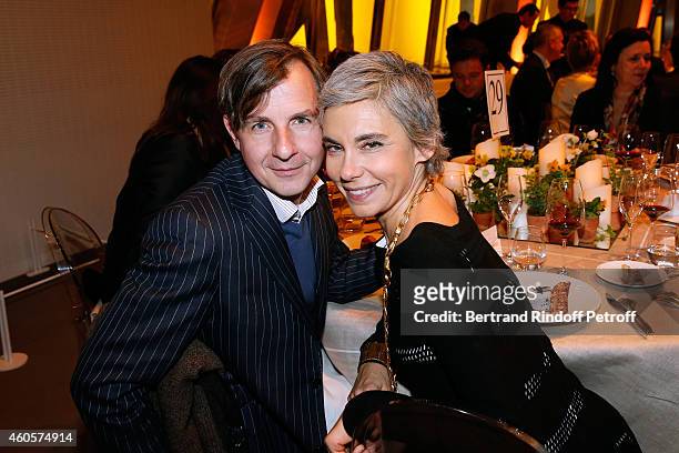 Scutor Johan Creten and Elizabeth Quin attend the 'Fondation Claude Pompidou' : Charity Party at Fondation Louis Vuitton on December 16, 2014 in...