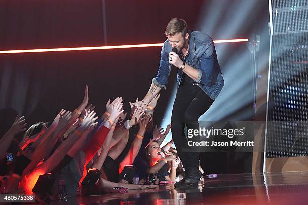 Charles Kelley, Hillary Scott, and Dave Haywood of Lady Antebellum perform at the 2014 American Country Countdown Awards at Music City Center on...