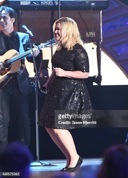 Kelly Clarkson performs at the 2014 American Country Countdown Awards at Music City Center on December 15, 2014 in Nashville, Tennessee.