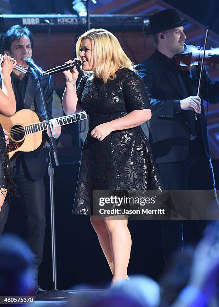 Kelly Clarkson performs at the 2014 American Country Countdown Awards at Music City Center on December 15, 2014 in Nashville, Tennessee.