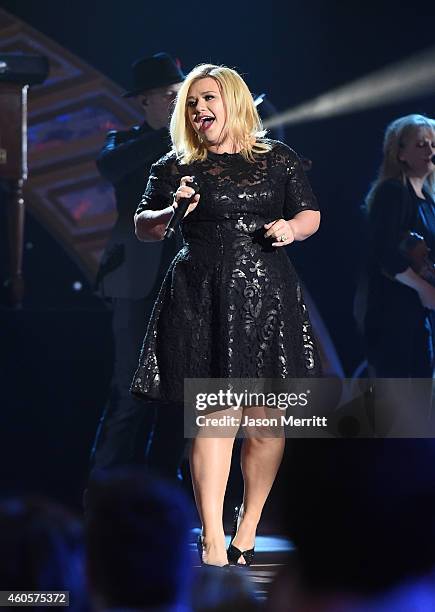 Kelly Clarkson performs at the 2014 American Country Countdown Awards at Music City Center on December 15, 2014 in Nashville, Tennessee.