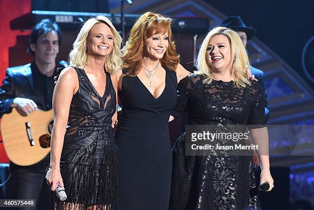 Miranda Lambert, Reba McEntire, and Kelly Clarkson perform at the 2014 American Country Countdown Awards at Music City Center on December 15, 2014 in...