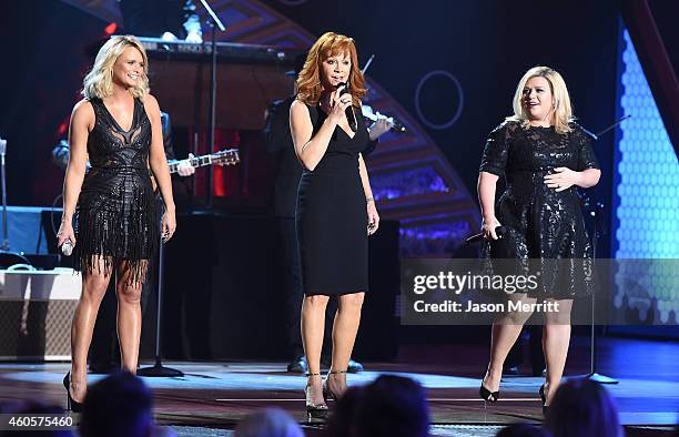 Miranda Lambert, Reba McEntire, and Kelly Clarkson perform at the 2014 American Country Countdown Awards at Music City Center on December 15, 2014 in...