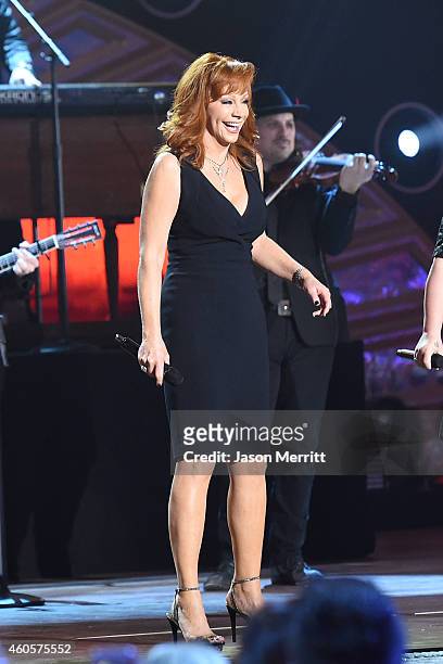 Recording artist Reba McEntire performs onstage at the 2014 American Country Countdown Awards at Music City Center on December 15, 2014 in Nashville,...