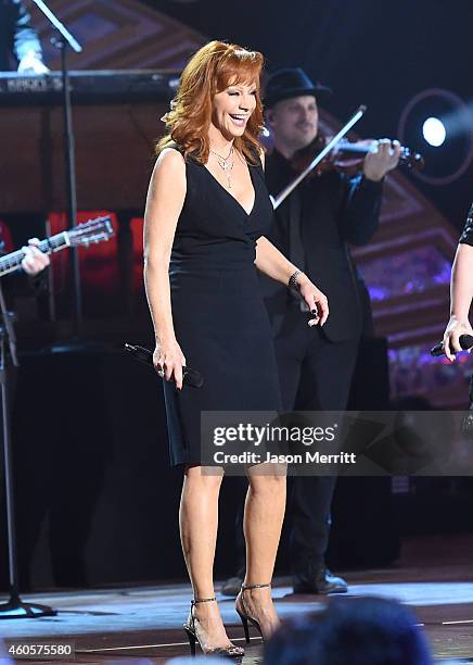 Recording artist Reba McEntire performs onstage at the 2014 American Country Countdown Awards at Music City Center on December 15, 2014 in Nashville,...