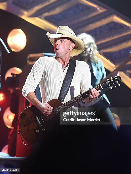 Honoree Kenny Chesney accepts the Groundbreaker Award onstage during the 2014 American Country Countdown Awards at Music City Center on December 15,...