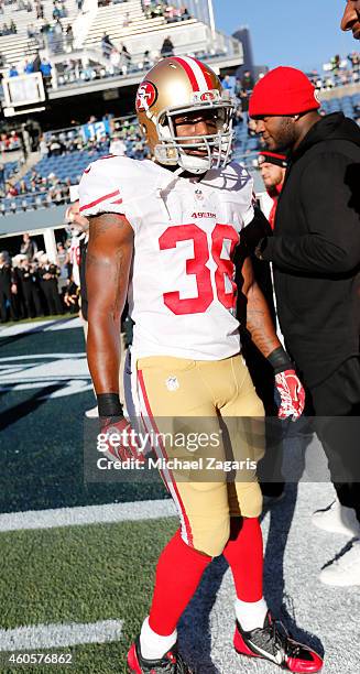 Alfonso Smith of the San Francisco 49ers stands on the field prior to the game against the Seattle Seahawks at CenturyLink Field on December 14, 2014...