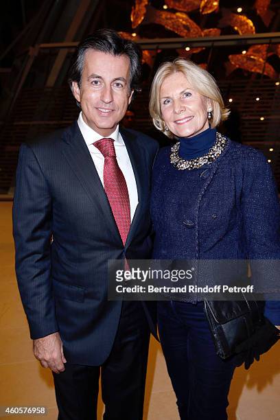 Cyril Karaoglan and Miss Alain Flammarion attend the 'Fondation Claude Pompidou' : Charity Party at Fondation Louis Vuitton on December 16, 2014 in...