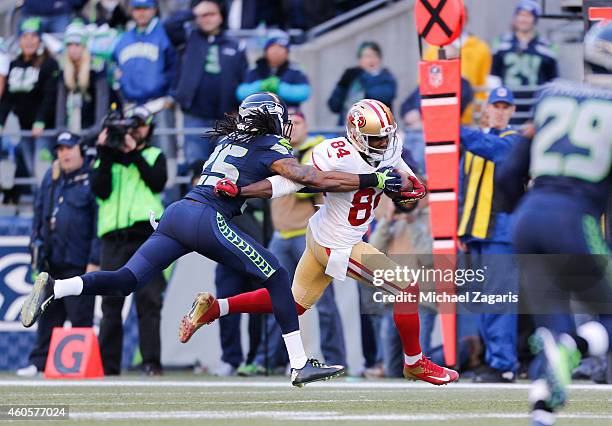 Brandon Lloyd of the San Francisco 49ers runs after making a reception during the game against the Seattle Seahawks at CenturyLink Field on December...