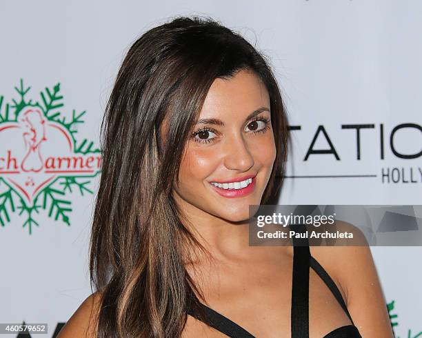 Model Cassie Cardelle attends the BenchWarmer 10th annual Winter Wonderland Toys For Tots Christmas Celebration at Station Hollywood at W Hollywood...