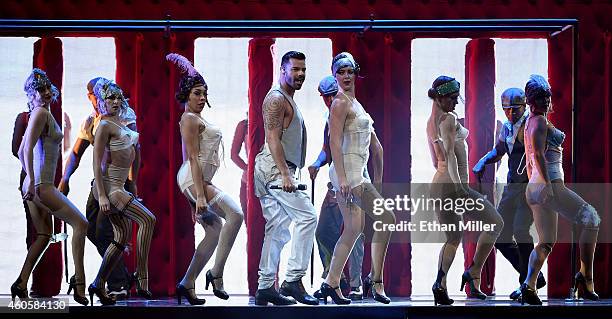 Recording artist Ricky Martin performs with dancers during the 15th annual Latin GRAMMY Awards at the MGM Grand Garden Arena on November 20, 2014 in...