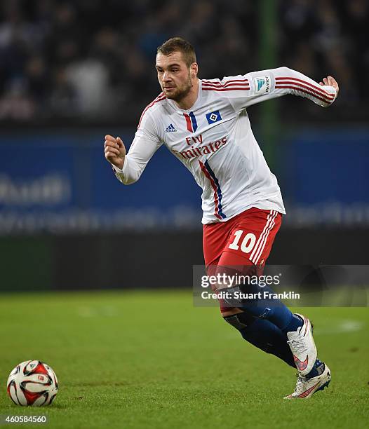 Pierre-Michel Lasogga of Hamburg in action during the Bundesliga match between Hamburger SV and VfB Stuttgart at Imtech Arena on December 16, 2014 in...