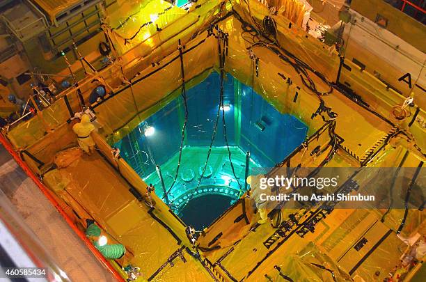 Workers check the No. 1 reactor at the Kansai Electric Power Co Takahama Nuclear Power Plant on December 16, 2014 in Takahama, Fukui, Japan. Although...