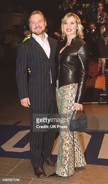 Kate Winslet, and husband Jim Threapleton attend the Premiere of, Holy Smoke,in London's West End, on March 21, 2000 in London, England.
