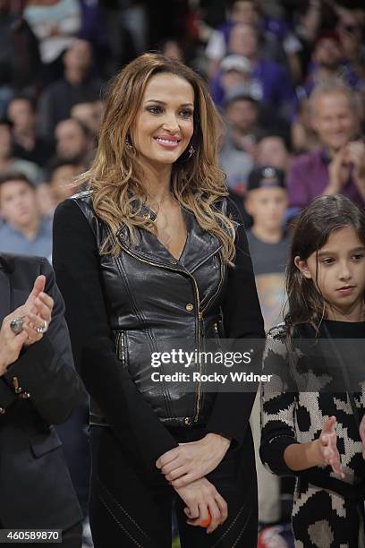 Aleka Kamila, wife of former Sacramento King Peja Stojakovic, watches as her husbands jersey is retired during halftime against the Oklahoma City...