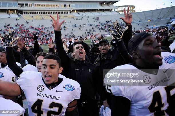 Head coach of the Vanderbilt Commodores James Franklin celebrates with his team following a victory over the Houston Cougars in the BBVA Compass Bowl...