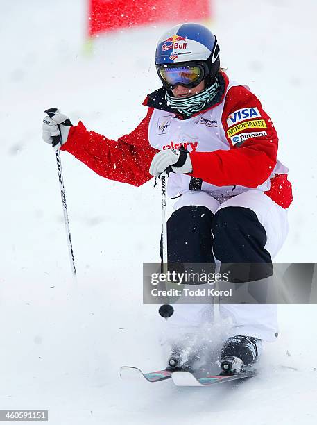 Heather McPhie if the U.S. Competes during the women's moguls finals at the FIS Freestyle Ski World Cup January 4, 2014 in Calgary, Alberta, Canada.