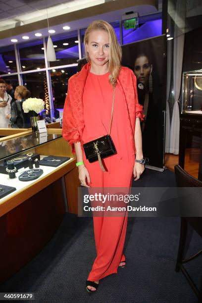 Angelika Timanina attends Haute Time Russia Hosts Jacob & Co. And ECJ Holiday Party at Sunny Isles Beach Gallery on January 3, 2014 in North Miami...