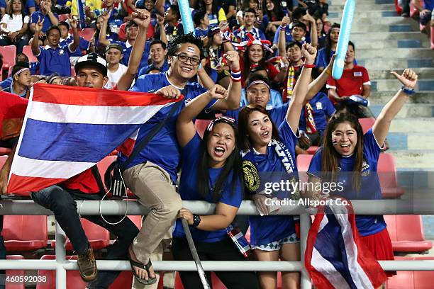 Thailand fans cheer during the 2014 AFF Suzuki Cup final 1st leg match between Thailand and Malaysia at Rajamangala National Stadium on December 17,...