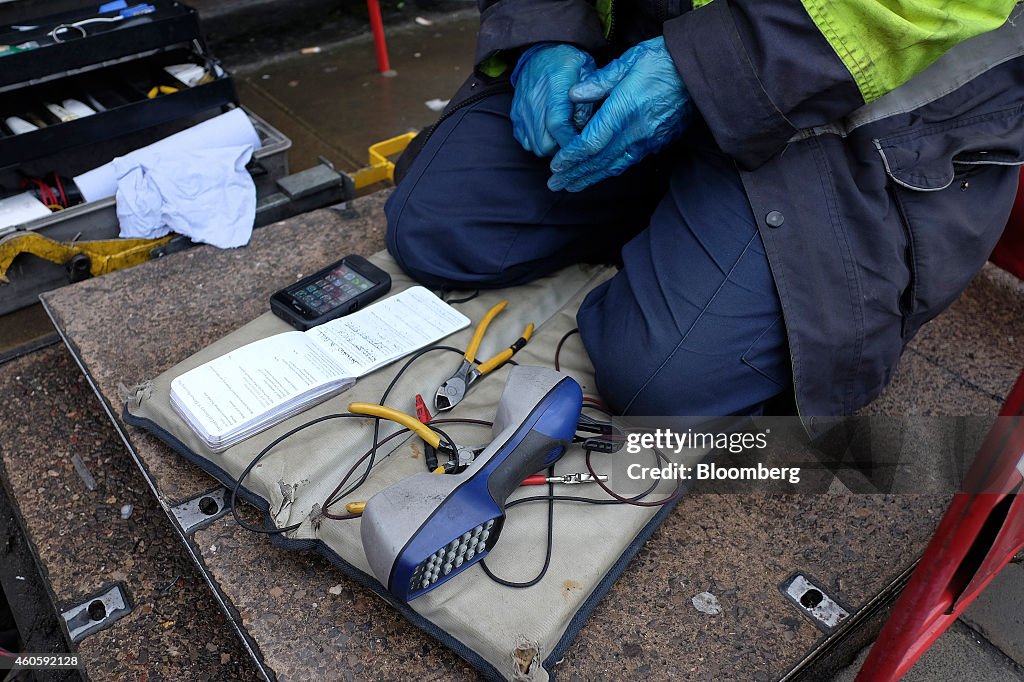 Bt Network Engineer Wire cutters and telephone line testing equipment sits in front of a ...