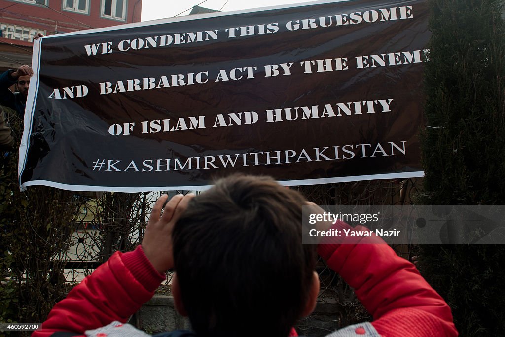 Muslims In Kasmir Pray For Victims Of The Pakistan School Attack