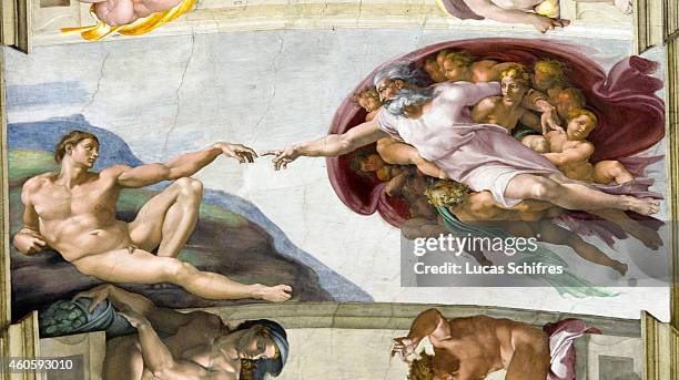 The Creation of Adam by Michelangelo is painted on the ceiling of the Sistine Chapel, in the Vatican Museums on August 4 in Rome, Italy. Vatican...