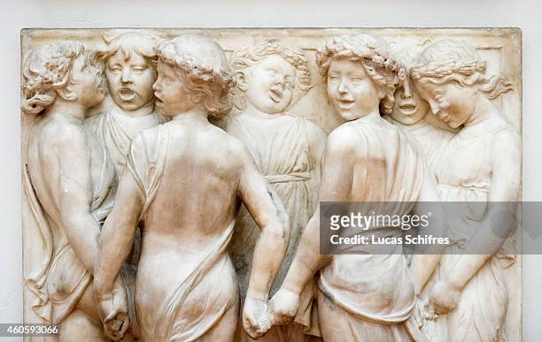 Detail ofa sculpture for a Cantoria or singing-gallery by Luca della Robbia is housed in the Museo dell'Opera del Duomo on August 14 in Florence,...