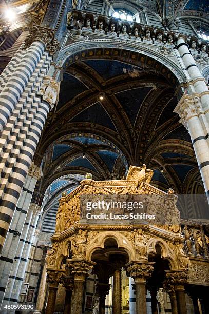 The pulpit under the nave of Siena Cathedral on August 12 in Siena, Tuscany, Italy. The Siena Cathedral is a medieval church dedicated from its...