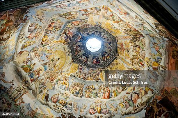 Vasari's frescoes adorn Brunelleschi's dome of Florence Cathedral or Basilica of Saint Mary of the Flower on August 14 in Florence, Tuscany, Italy....