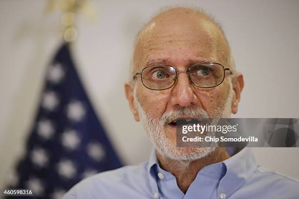 Alan Gross makes a statement to the news media at the law offices of Gilbert LLC after arriving back in the United States December 17, 2014 in...
