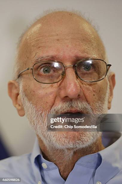 Alan Gross makes a statement to the news media at the law offices of Gilbert LLC after arriving back in the United States December 17, 2014 in...