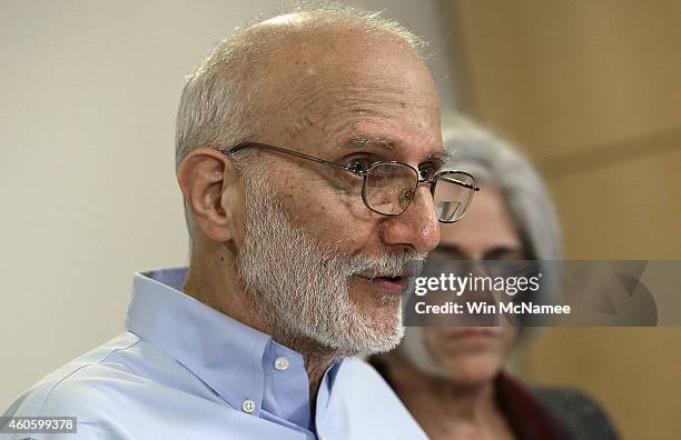 Alan Gross , recently released by Cuban authorities, makes brief remarks with his wife Judy during a press conference at his lawyer's office shortly...