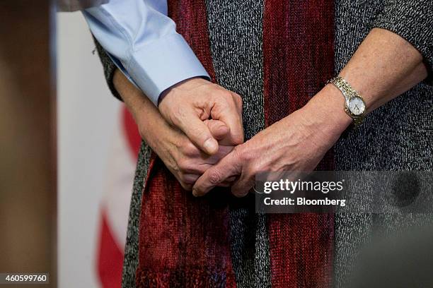 American aid worker Alan Gross, a former Cuban prisoner released on humanitarian grounds, left, holds onto the hand of his wife Judy Gross at a news...