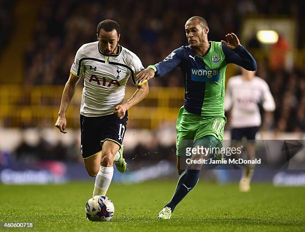 Andros Townsend of Tottenham Hotspur is closed down by Yoan Gouffran of Newcastle United during the Capital One Cup Quarter-Final match between...