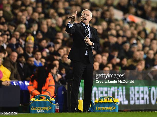 Alan Pardew, manager of Newcastle United reacts during the Capital One Cup Quarter-Final match between Tottenham Hotspur and Newcastle United at...