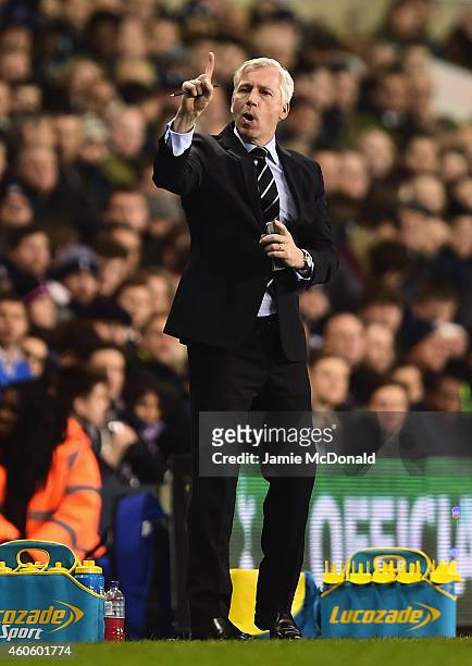Alan Pardew, manager of Newcastle United reacts during the Capital One Cup Quarter-Final match between Tottenham Hotspur and Newcastle United at...