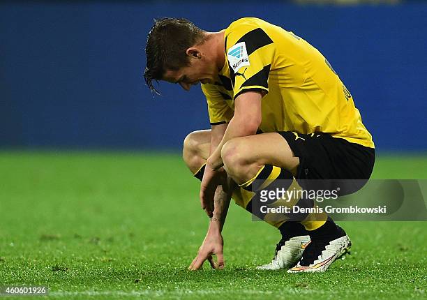 Erik Durm of Borussia Dortmund looks dejected after the Bundesliga match between Borussia Dortmund and VfL Wolfsburg at Signal Iduna Park on December...