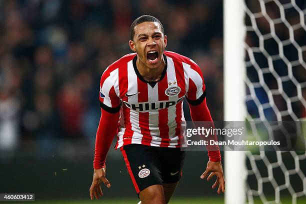 Memphis Depay of PSV Eindhoven celebrates scoring his teams winning goal in the final minute of the game during the Eredivisie match between PSV...