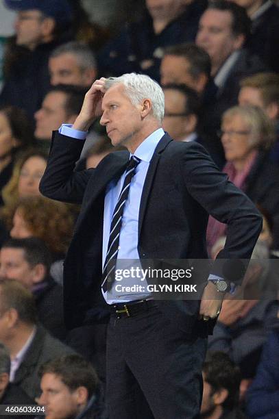 Newcastle United's English manager Alan Pardew gestures on the touchline during the English League Cup quarter-final football match between Tottenham...